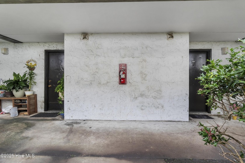 EXCELLENT INVESTMENT OPPORTUNITY! This first-floor condo offers - Beach Condo for sale in Wilmington, North Carolina on Beachhouse.com