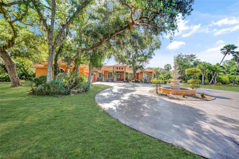 Welcome to this custom-designed Mediterranean-style estate home - Beach Home for sale in Port Charlotte, Florida on Beachhouse.com