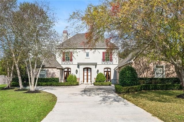 Welcome to 340 Sandalwood Drive, a beautifully updated French - Beach Home for sale in Mandeville, Louisiana on Beachhouse.com