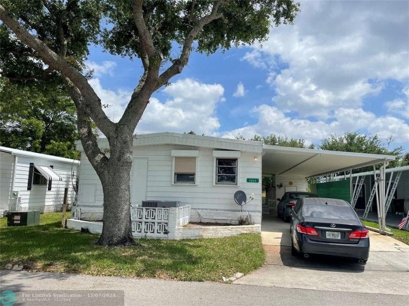 Beautiful 2/2 double wide on the Golf course - carport - shed - - Beach Home for sale in Davie, Florida on Beachhouse.com