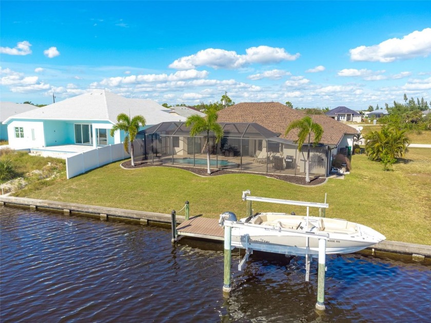 INCREDIBLE VALUE HERE in this 2016 custom-built, pristine pool - Beach Home for sale in Port Charlotte, Florida on Beachhouse.com