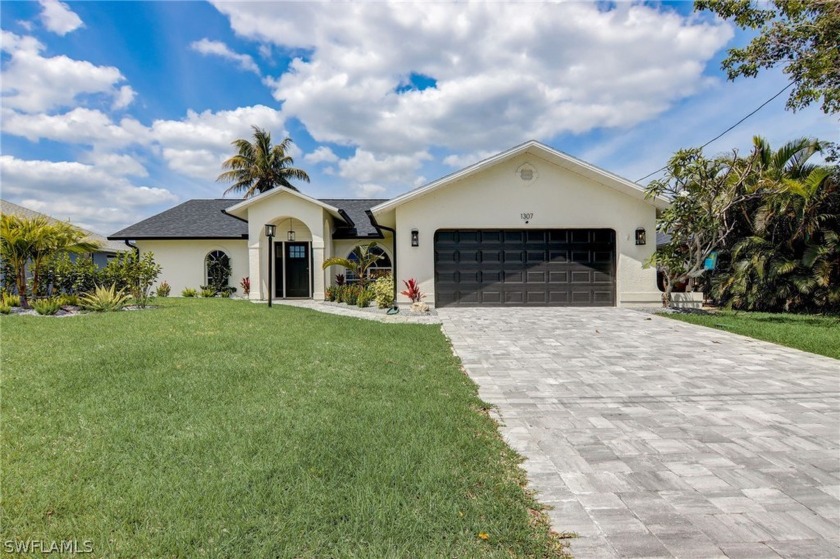 Welcome to your recently updated dream waterfront oasis! This - Beach Home for sale in Cape Coral, Florida on Beachhouse.com