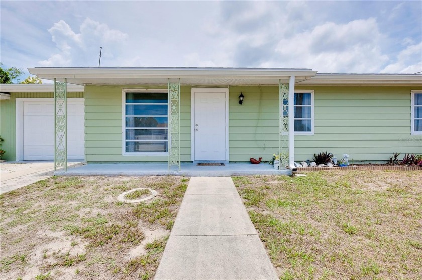 Stunning canal view! This immaculate, move-in-ready home - Beach Home for sale in North Port, Florida on Beachhouse.com