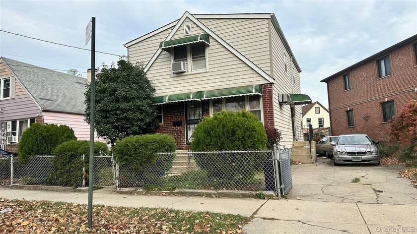 2 Family house situated on an irregular 54x95 lot, offering - Beach Home for sale in East Elmhurst, New York on Beachhouse.com