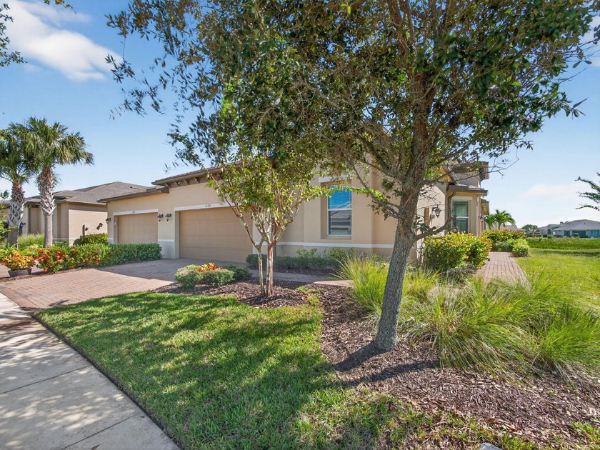 Set on a unique lot with stunning lakefront and preserve views - Beach Home for sale in Port Saint Lucie, Florida on Beachhouse.com