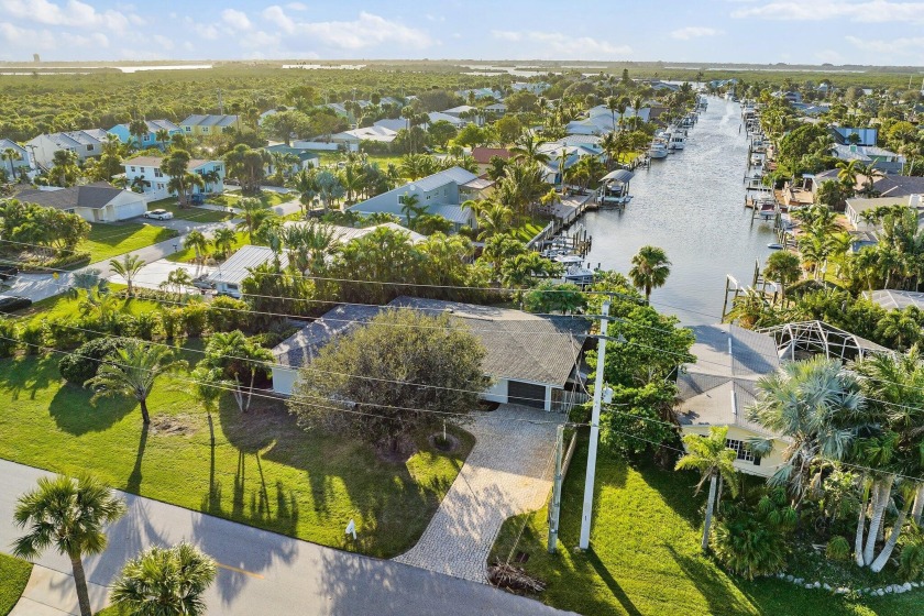WATERFRONT GEM WITH A PRIVATE DOCK, OCEAN ACCESS & NO FIXED - Beach Home for sale in Hutchinson Island, Florida on Beachhouse.com