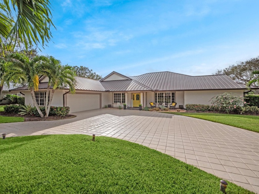 Step into luxury with this stunning 3-bedroom, 3-bath pool home - Beach Home for sale in Stuart, Florida on Beachhouse.com