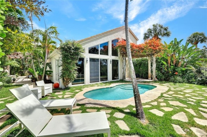 Unique and stylish... rarely available river-facing home in - Beach Home for sale in Bonita Springs, Florida on Beachhouse.com