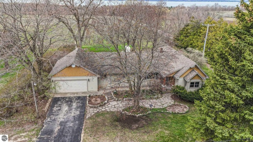 Perched on top of Old Mission Peninsula and tucked between - Beach Home for sale in Traverse City, Michigan on Beachhouse.com