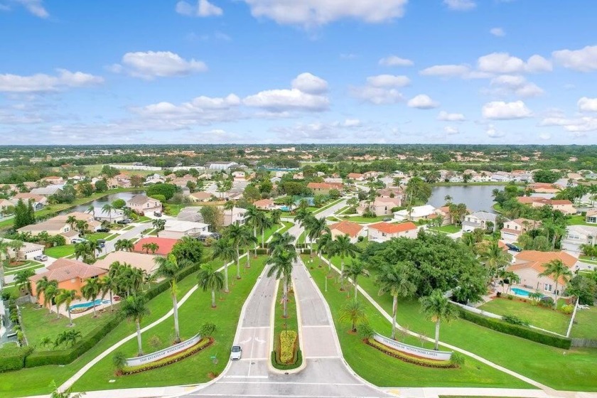 Boynton Beach - The Estate at Windchime Lakes, a highly - Beach Home for sale in Boynton Beach, Florida on Beachhouse.com