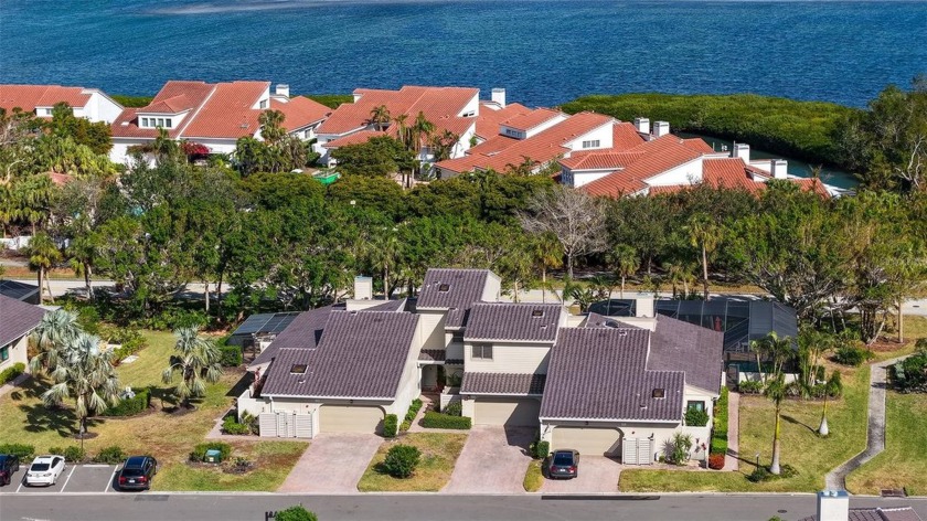 Nestled within the exclusive gated enclave of Bay Isles on - Beach Home for sale in Longboat Key, Florida on Beachhouse.com