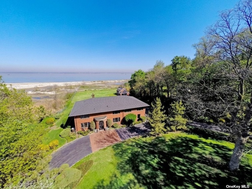 This majestic Sands Point Waterfront Estate sits on 4.71 scenic - Beach Home for sale in Sands Point, New York on Beachhouse.com