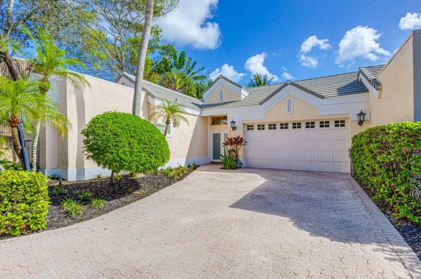 This absolutely stunning WATERFRONT courtyard home sits directly - Beach Townhome/Townhouse for sale in Jupiter, Florida on Beachhouse.com