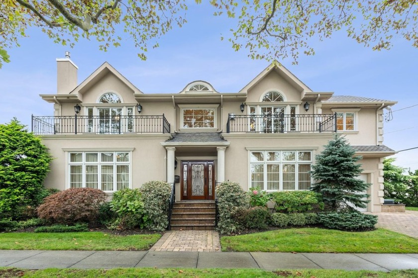 This Young Mediterranean Center Hall Home Is Located On A Prime - Beach Home for sale in Atlantic Beach, New York on Beachhouse.com