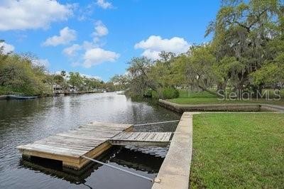 Boat or Drive up to this ideal waterfront estate home with .4 - Beach Home for sale in New Port Richey, Florida on Beachhouse.com