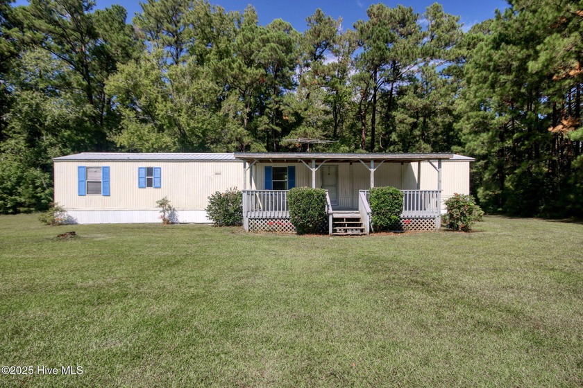 Well-maintained single wide mobile home on 1.3 ACRES within - Beach Home for sale in Ocean Isle Beach, North Carolina on Beachhouse.com