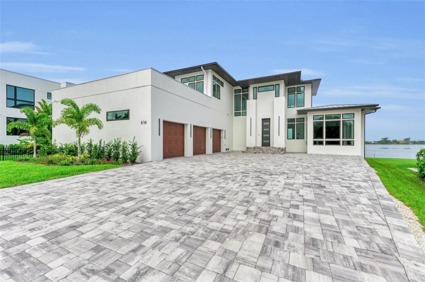 Welcome to this exclusive 2024 waterfront estate by Pileggi - Beach Home for sale in Osprey, Florida on Beachhouse.com