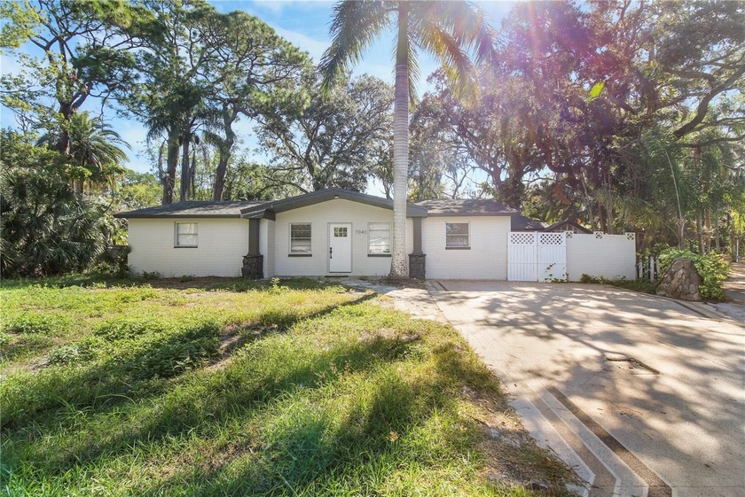 Water Access Pool Home with Dock & Bonus Living Space in New - Beach Home for sale in New Port Richey, Florida on Beachhouse.com