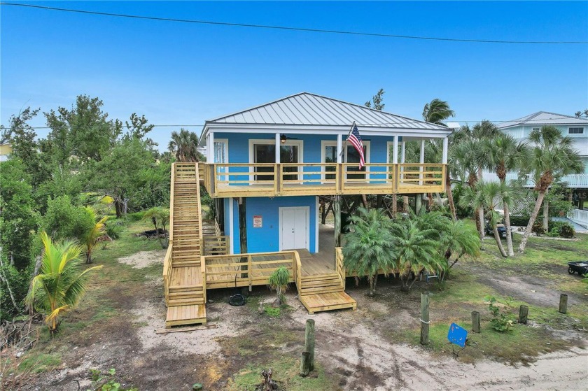 Pelican Place Beach House* is one of a kind and calls Little - Beach Home for sale in Placida, Florida on Beachhouse.com