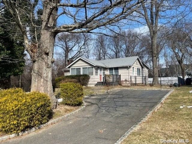 This Three Bedroom 1.5 Bath Ranch Sits on .18 Acre in Beautiful - Beach Home for sale in Miller Place, New York on Beachhouse.com