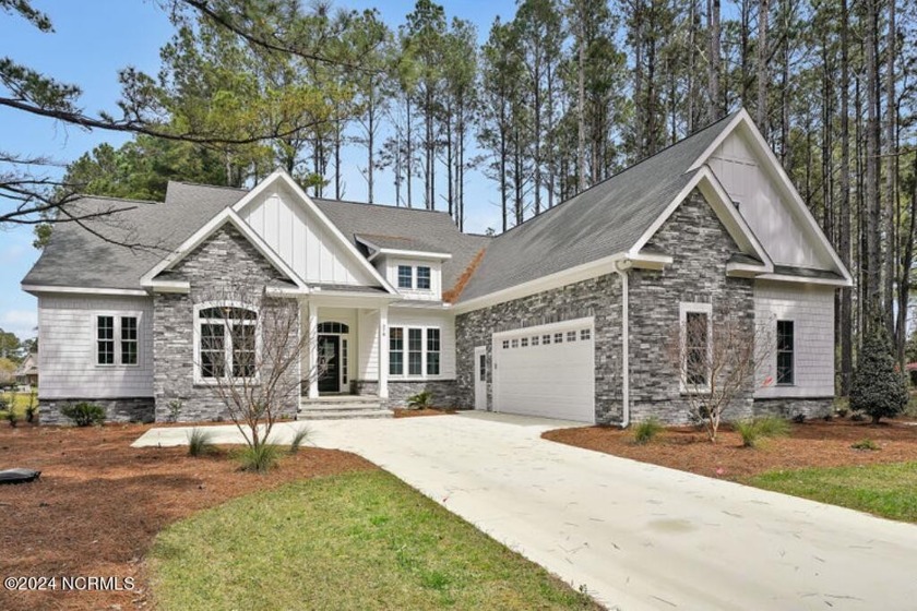 This craftsman style home, spans over 2800 square feet for a - Beach Home for sale in Calabash, North Carolina on Beachhouse.com