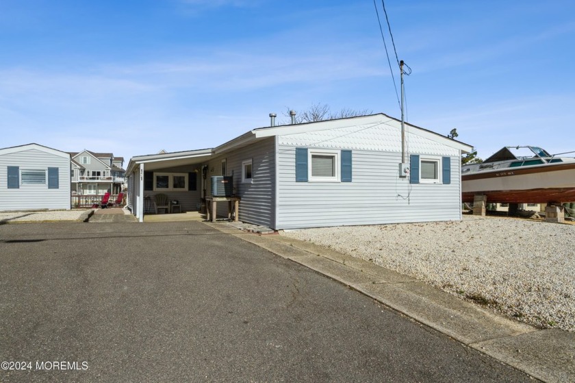 Amazing waterfront home on wide lagoon in Mystic Island. This - Beach Home for sale in Little Egg Harbor, New Jersey on Beachhouse.com