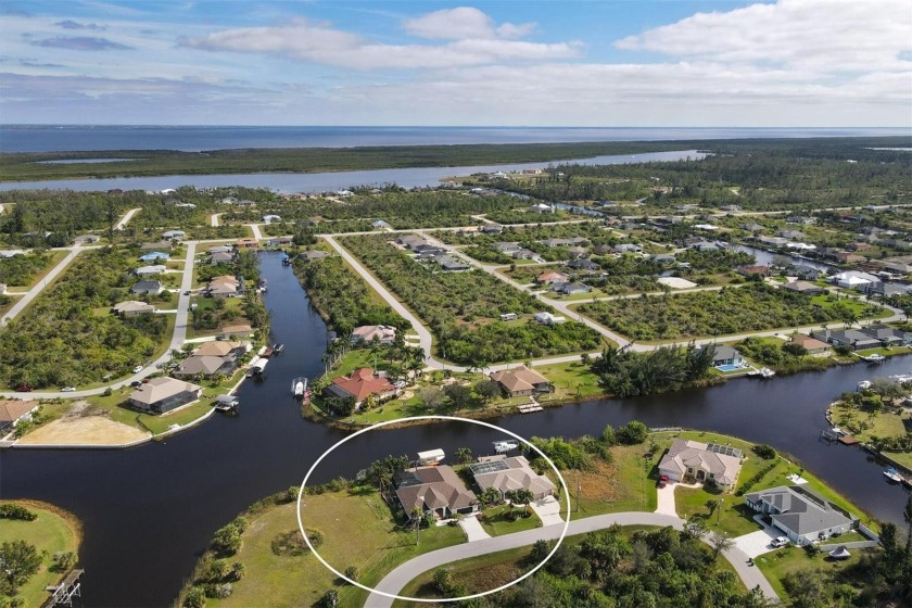 This Waterfront 4 Bedroom Retreat in South Gulf Cove with GULF - Beach Home for sale in Port Charlotte, Florida on Beachhouse.com