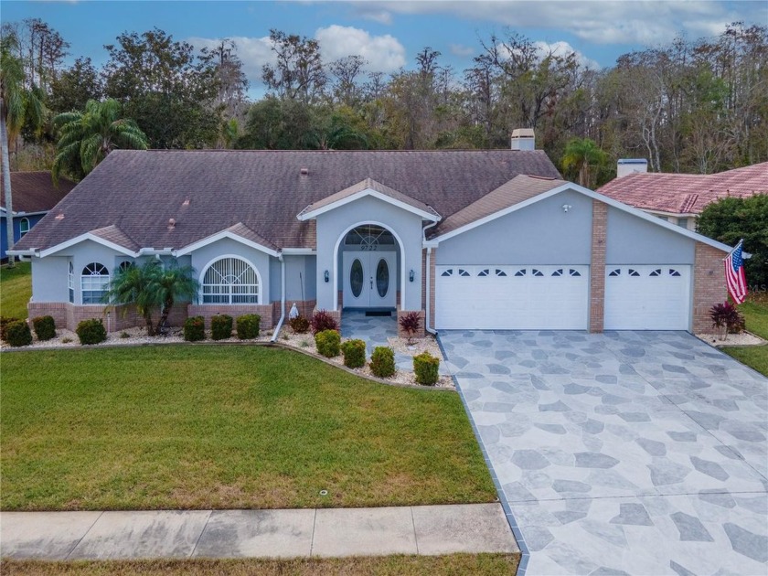 YOUR DREAM HOME AWAITS in Hunters Ridge! This stunning 3-bedroom - Beach Home for sale in New Port Richey, Florida on Beachhouse.com