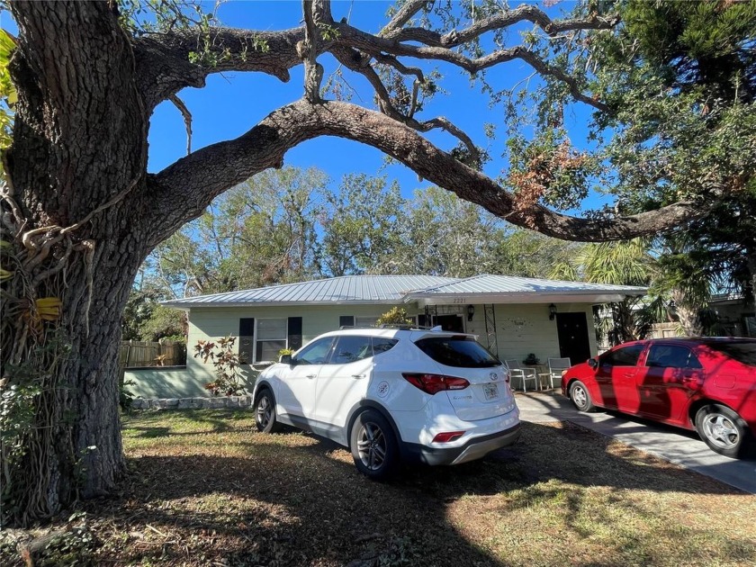 Charming and yet solid block home with a durable metal roof - Beach Home for sale in Gulfport, Florida on Beachhouse.com