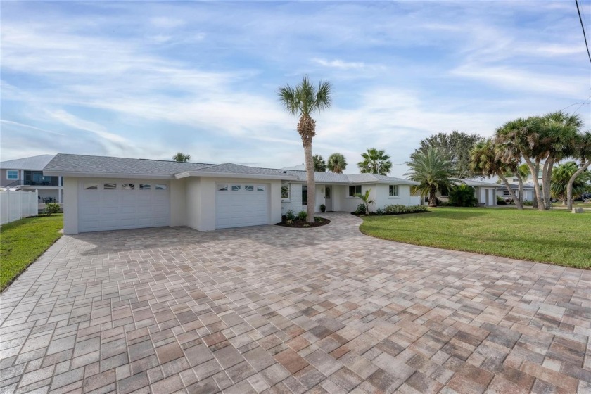 Step into waterfront luxury with this captivating three-bedroom - Beach Home for sale in Englewood, Florida on Beachhouse.com