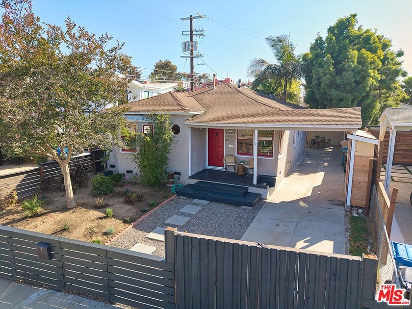 Tucked away north of Rose Avenue on a coveted corner lot, this - Beach Home for sale in Venice, California on Beachhouse.com
