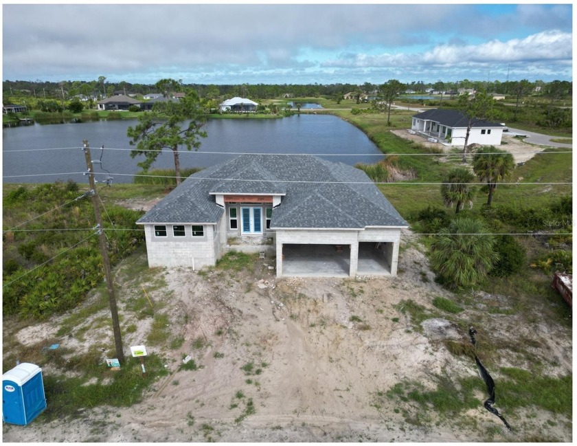 Under Construction. Enjoy 2,053 sq ft of living space in this - Beach Home for sale in Placida, Florida on Beachhouse.com