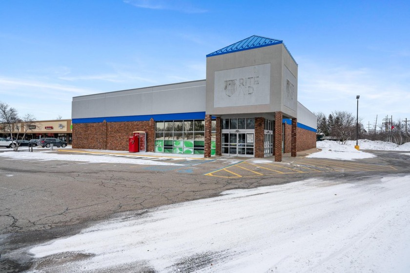 Prime retail opportunity in Charlevoix! This high-visibility - Beach Commercial for sale in Charlevoix, Michigan on Beachhouse.com