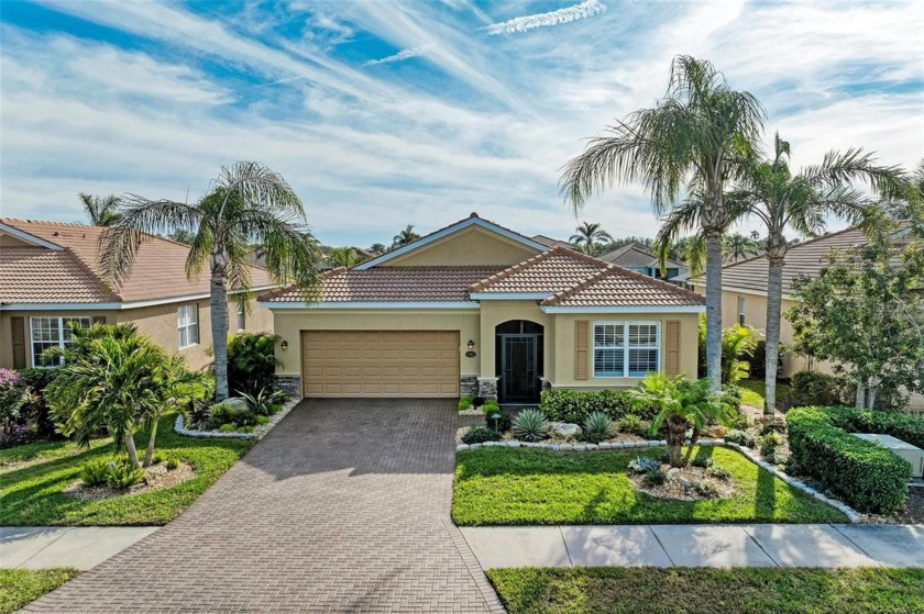 This exquisite residence within River Strand Golf and Country - Beach Home for sale in Bradenton, Florida on Beachhouse.com