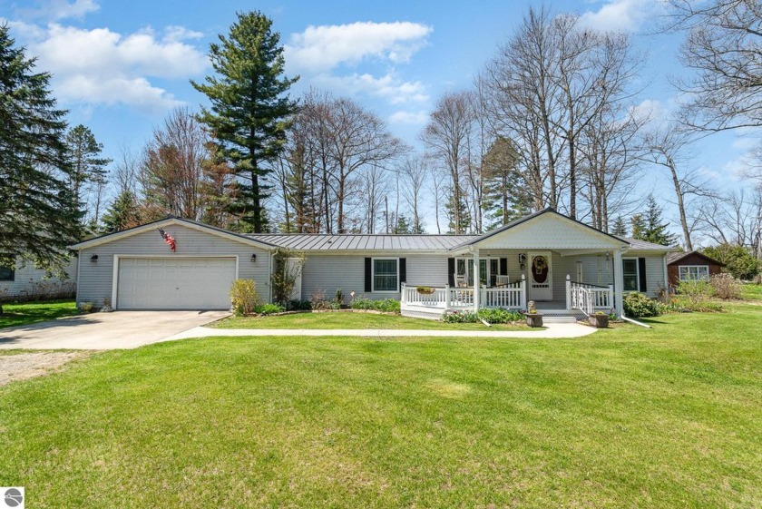 Experience the perfect blend of charm, comfort, and Lake Huron - Beach Home for sale in Tawas City, Michigan on Beachhouse.com