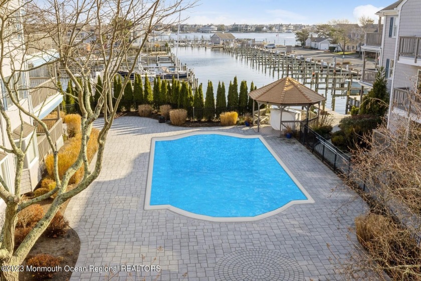THIS BEAUTIFUL,3 BEDROOM 2 FULL BATH WATERFRONT CONDO WITH A - Beach Condo for sale in Point Pleasant, New Jersey on Beachhouse.com