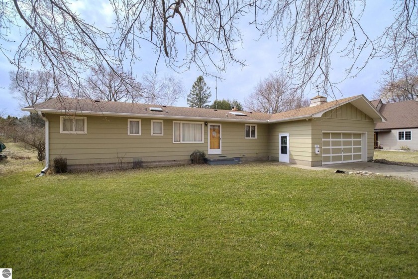 Wonderful one floor living in desired location that feels - Beach Home for sale in Manistee, Michigan on Beachhouse.com