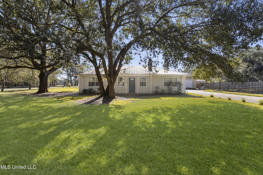 Fully-furnished home sitting on a 1/2 acre corner lot! This home - Beach Home for sale in Long Beach, Mississippi on Beachhouse.com