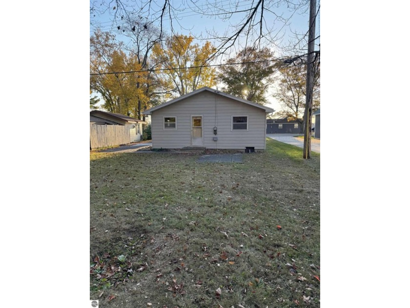 Discover this hidden gem--perfect as a year-round residence or a - Beach Home for sale in Oscoda, Michigan on Beachhouse.com