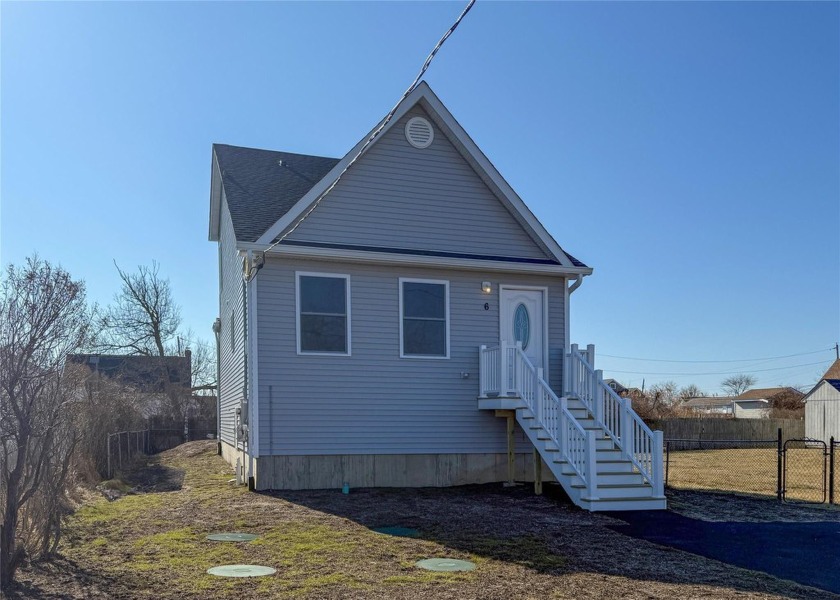 If you love the beach, boating, paddle boarding, and being close - Beach Home for sale in Mastic Beach, New York on Beachhouse.com