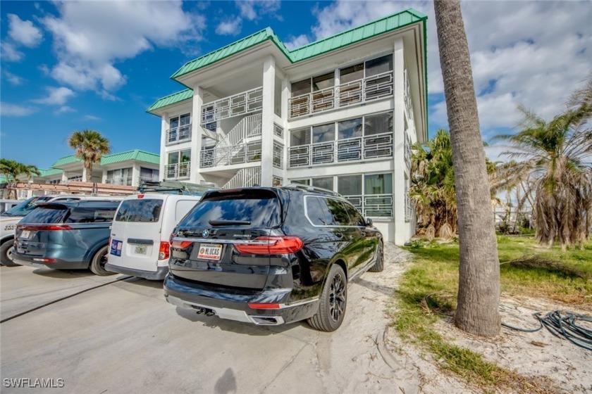 Embrace coastal living in this Turnkey, fully renovated, corner - Beach Condo for sale in Fort Myers Beach, Florida on Beachhouse.com