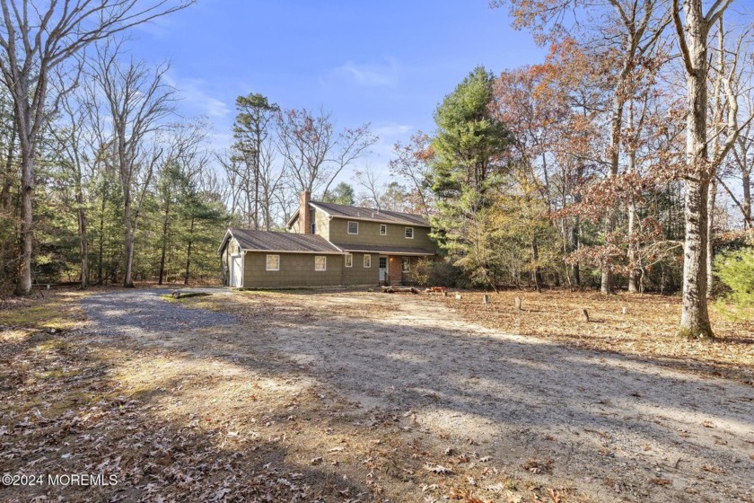 Welcome to your private wooded sanctuary on 1.64 acres. Down a - Beach Home for sale in Little Egg Harbor, New Jersey on Beachhouse.com