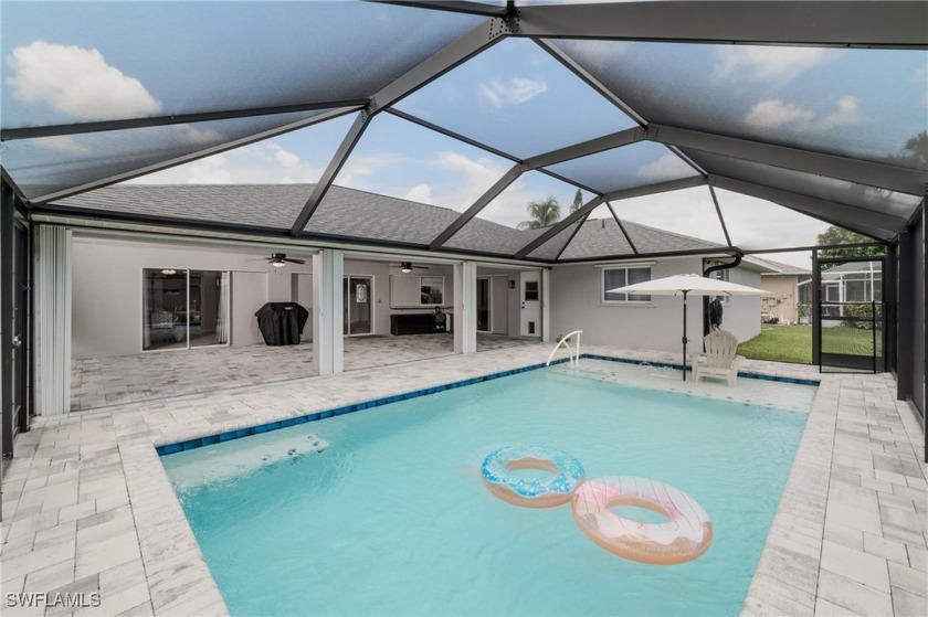 Welcome to your dream home! This exquisite waterfront property - Beach Home for sale in Cape Coral, Florida on Beachhouse.com