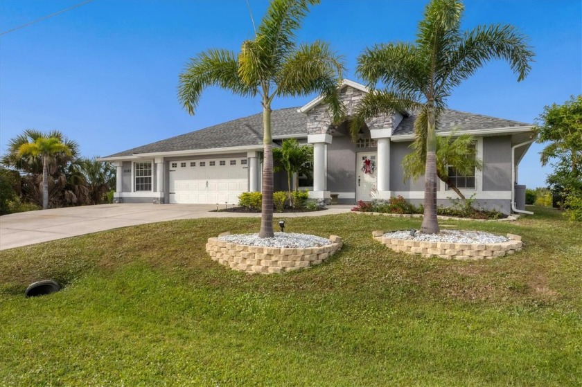 Welcome to this expansive three-bedroom, two-bathroom pool home - Beach Home for sale in Port Charlotte, Florida on Beachhouse.com