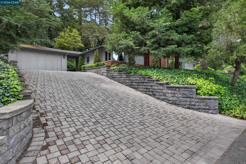 Tucked into a peaceful, park-like setting, this 3-bedroom - Beach Home for sale in Orinda, California on Beachhouse.com