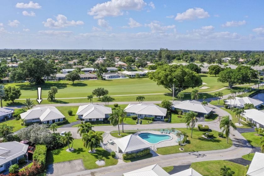 Enjoy the beautiful panoramic golf course views in this bright - Beach Home for sale in Atlantis, Florida on Beachhouse.com