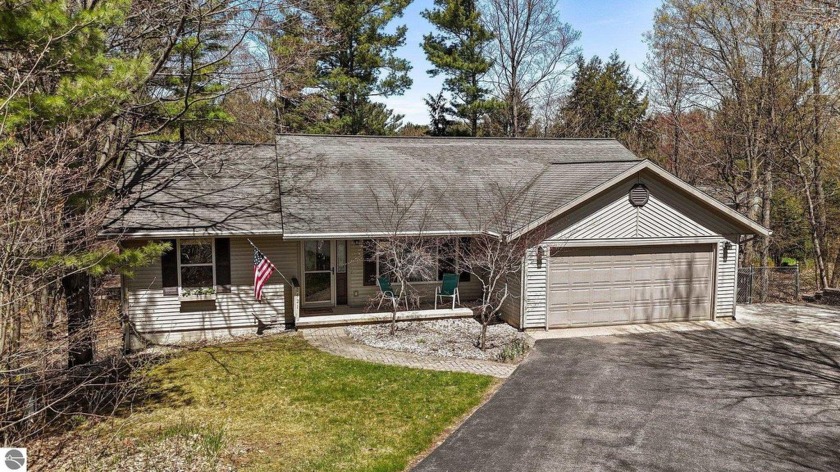 Welcome to this lovely 3-bedroom, 2.5-bath ranch in a quiet - Beach Home for sale in Traverse City, Michigan on Beachhouse.com