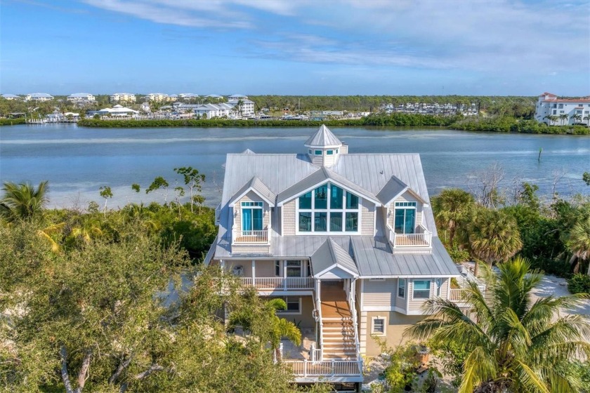 Welcome to a waterfront paradise on Palm Island, where coastal - Beach Home for sale in Placida, Florida on Beachhouse.com