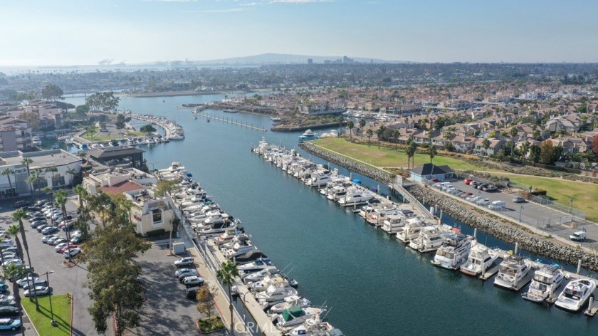 Swaying palm trees and coastal breezes are your invitation to - Beach Home for sale in Long Beach, California on Beachhouse.com