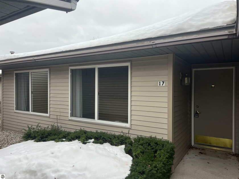 Welcome to 5327 Gray Rd, Unit 17, a charming property nestled in - Beach Condo for sale in Traverse City, Michigan on Beachhouse.com